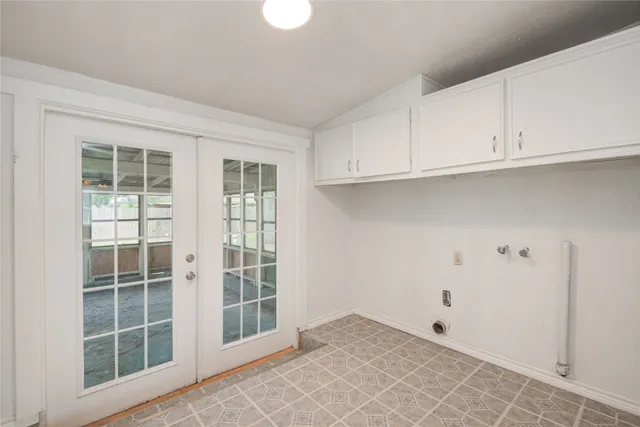 a view of empty room with windows