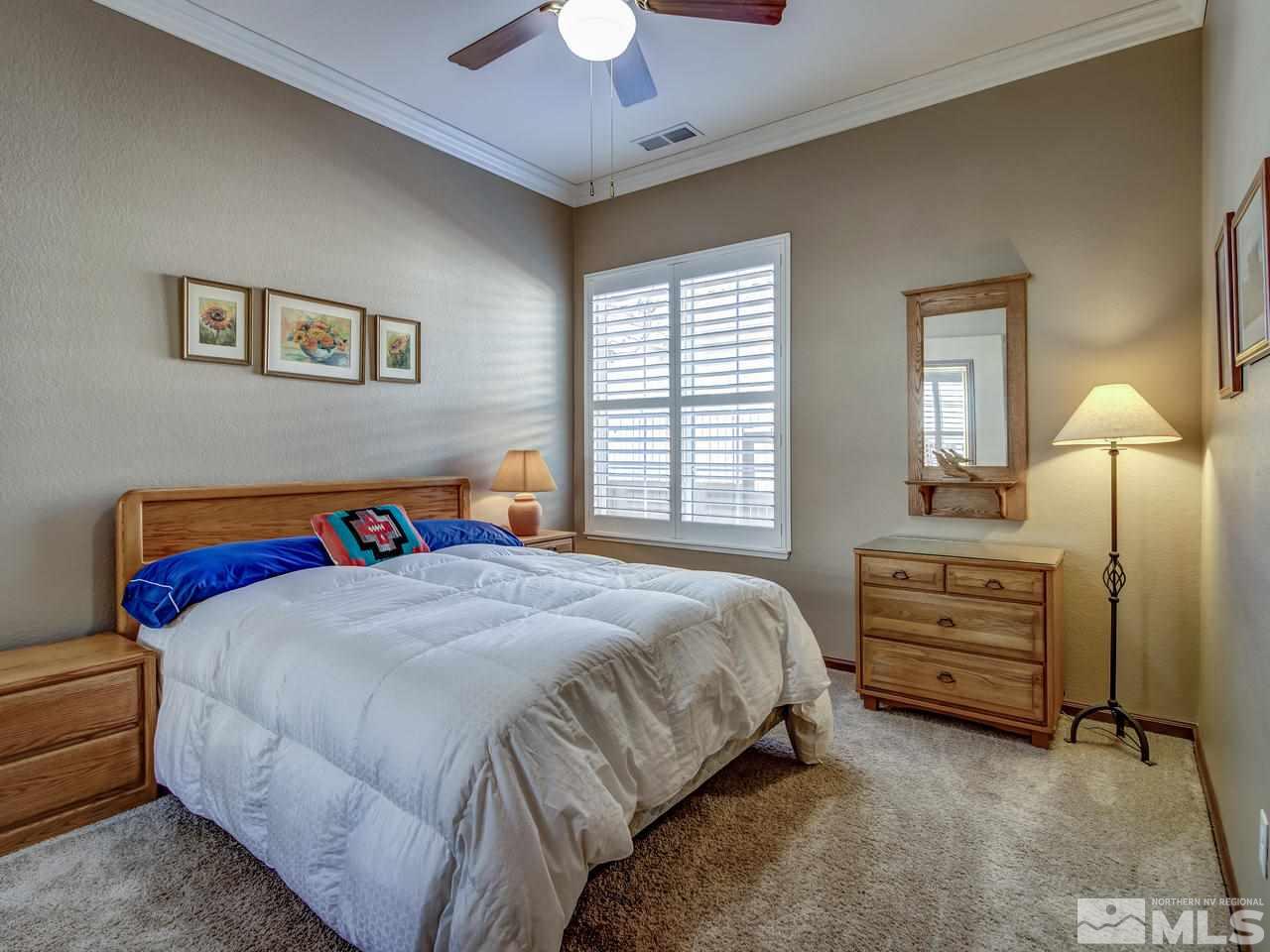 1695 Crater Court Reno, NV 89521 - Photo 16 of 25 a bedroom with a bed and a closet