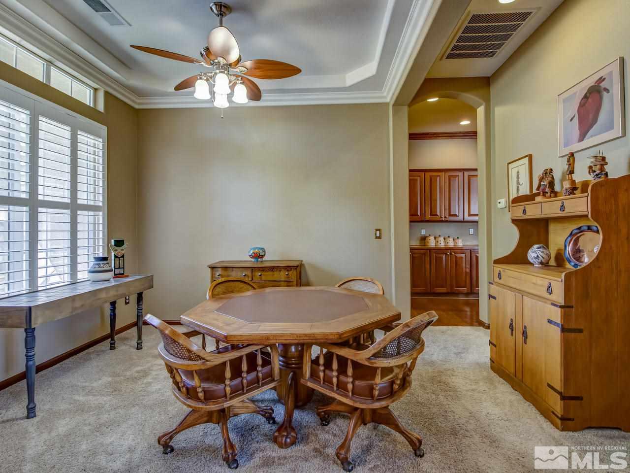 1695 Crater Court Reno, NV 89521 - Photo 5 of 25 a dining room with furniture and window