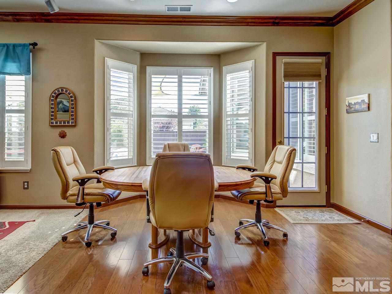 1695 Crater Court Reno, NV 89521 - Photo 10 of 25 a view of a workspace with furniture and a window