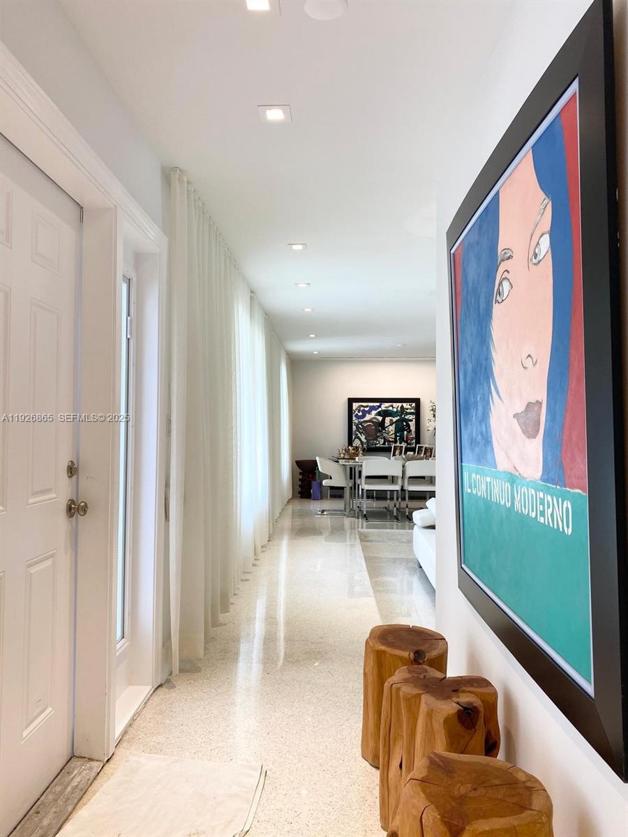 9121 Southwest 85th Street, Unit 2 Miami, FL 33173 - Photo 1 of 26 a living room with furniture and a flat screen tv