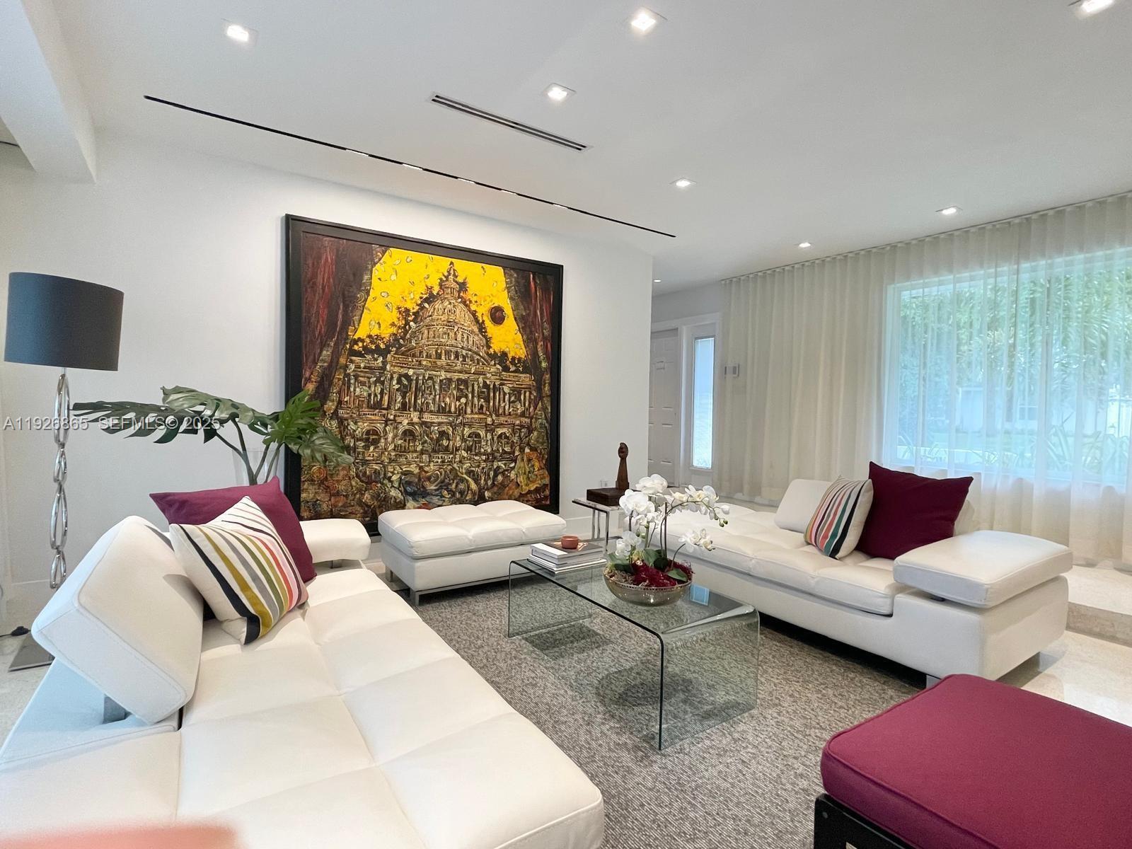 9121 Southwest 85th Street, Unit 2 Miami, FL 33173 - Photo 2 of 26 a living room with furniture and a large window