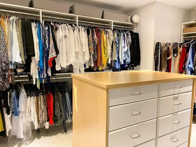 a bathroom with a sink toilet and mirror