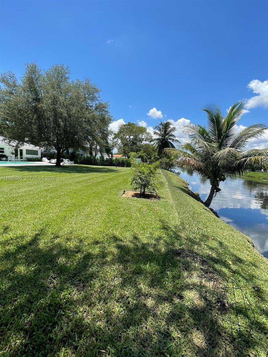 9121 Southwest 85th Street, Unit 2 Miami, FL 33173 - Photo 8 of 26 a view of a garden