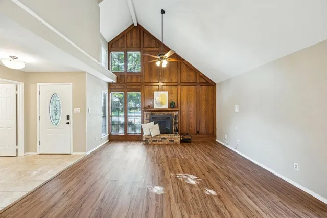 a view of a house with wooden floor and a sink