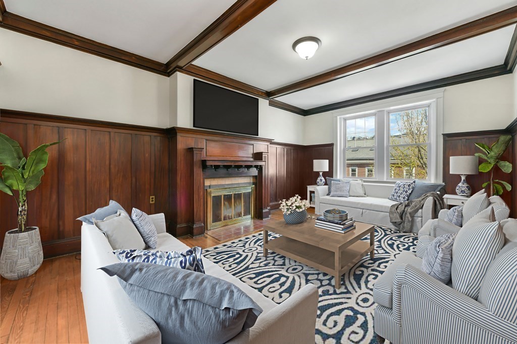 34 Garrison Road, Unit FIVE Brookline, MA 02445 - Photo 3 of 19 a living room with furniture kitchen view and a large window