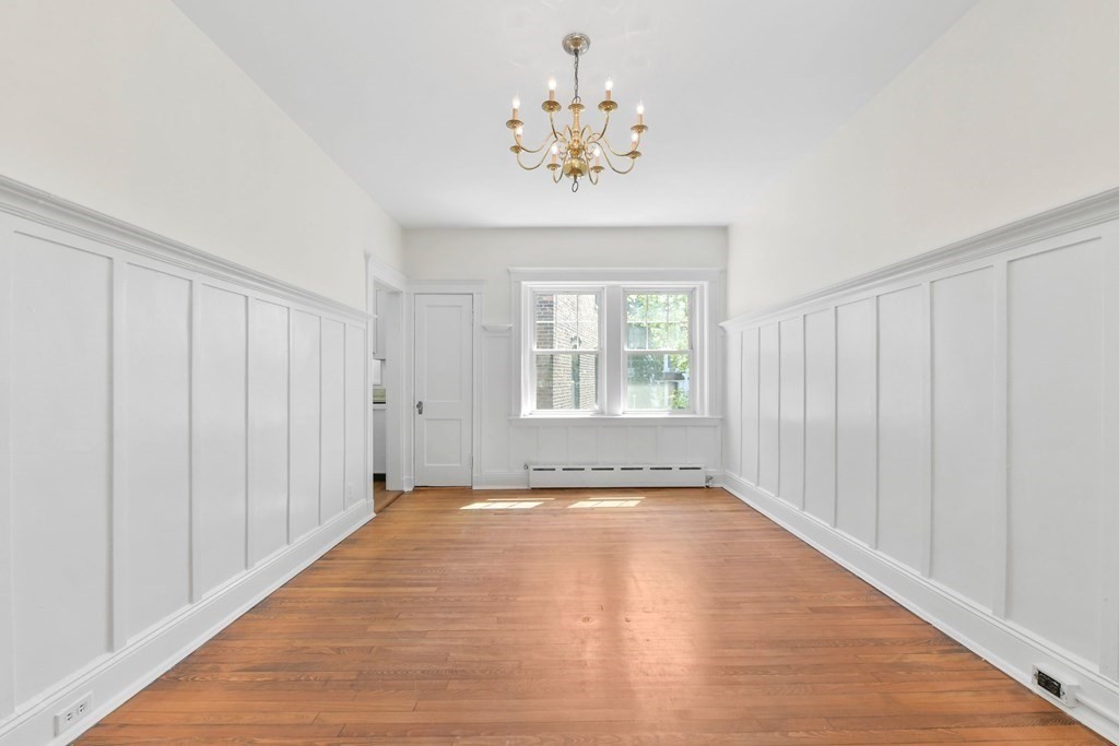 34 Garrison Road, Unit FIVE Brookline, MA 02445 - Photo 8 of 19 a view of an empty room with a window