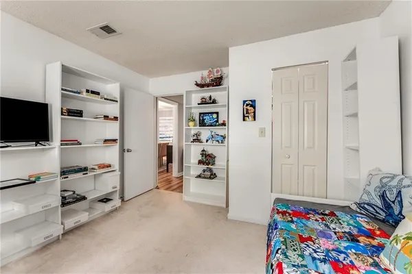 a room with furniture and flowers
