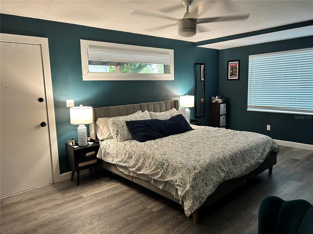 3320 Conway Gardens Road Orlando, FL 32806 - Photo 21 of 21 a bedroom with a bed and a walk in closet