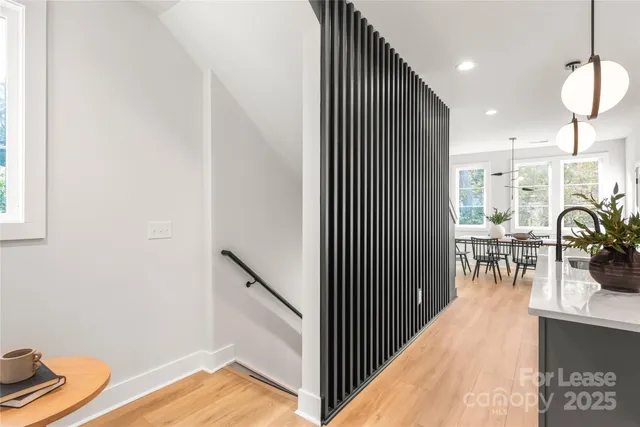a view of a dining room with furniture and a rug