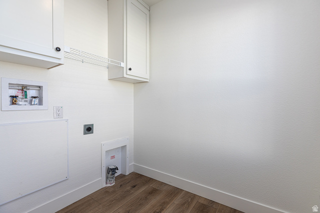 749 Riddle Drive Fredonia, AZ 86022 - Photo 10 of 41 Laundry area with hookup for a washing machine, dark wood-type flooring, cabinet space, and electric dryer hookup