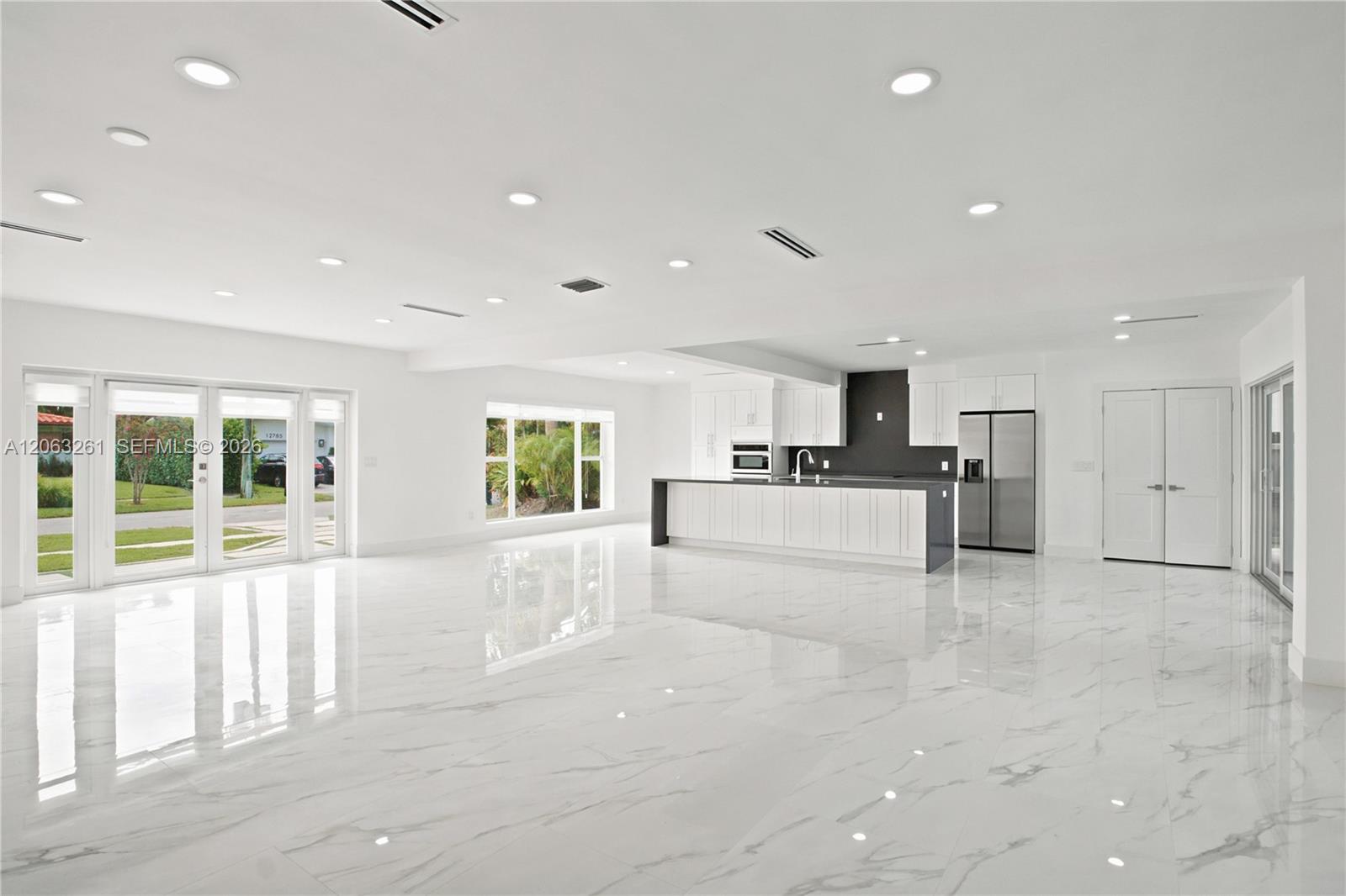 12810 Cyprus Road North Miami, FL 33181 - Photo 6 of 26 Living/Dining Room