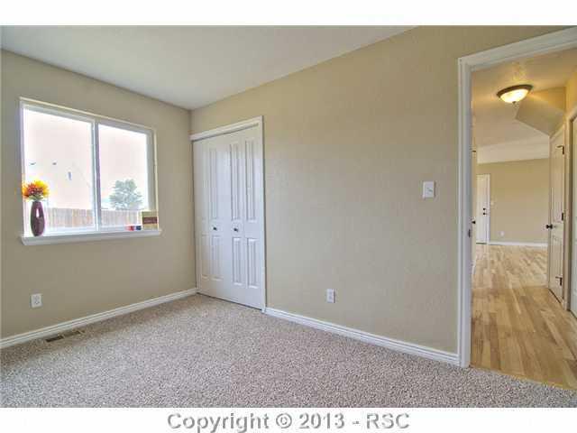 10865 Falling Star Road Fountain, CO 80817 - Photo 10 of 23 New carpet & paint throughout this main level master.