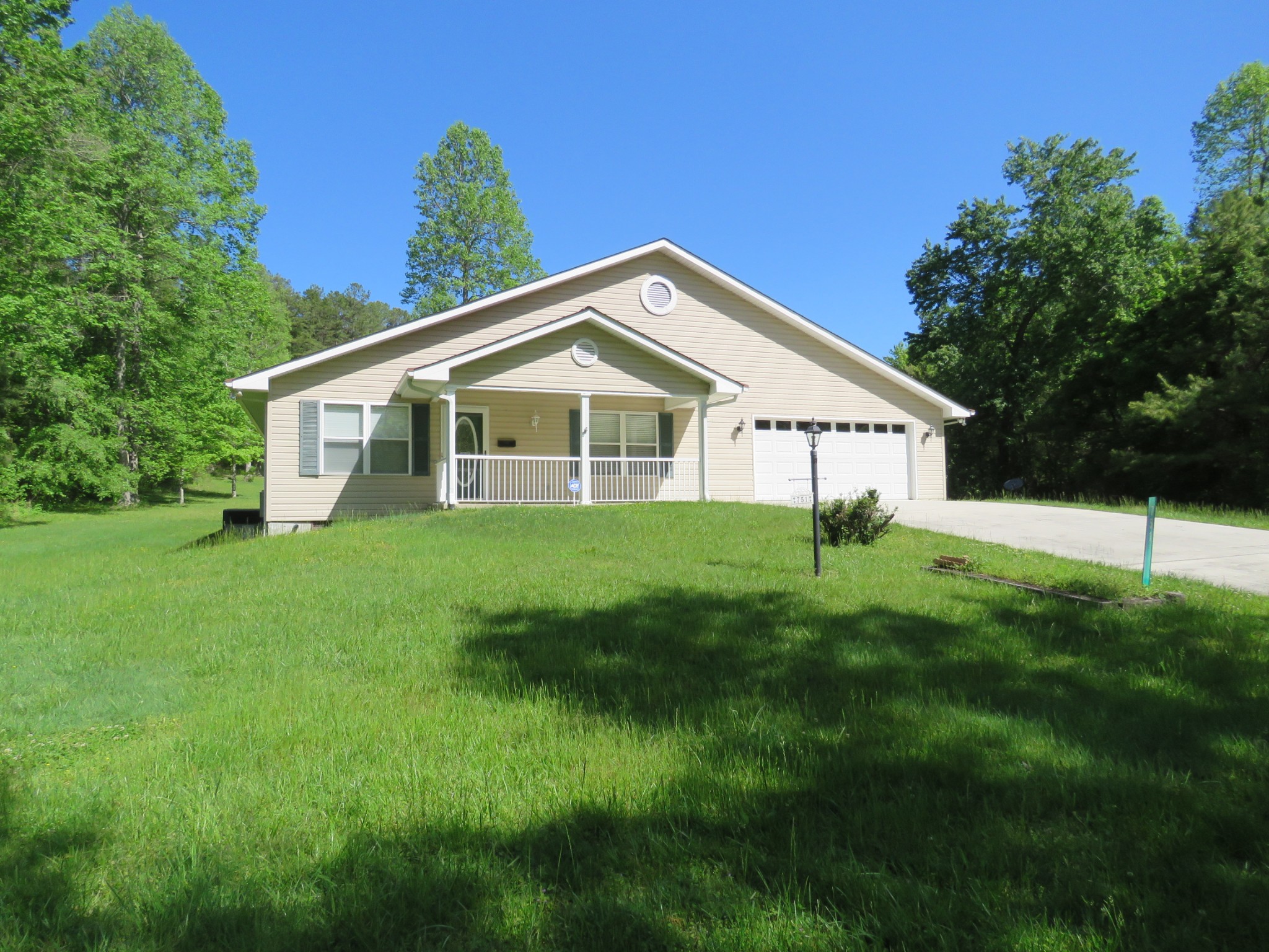 751 Yonside Drive Sparta, TN 38583 - Photo 1 of 36 a view of a house with a yard