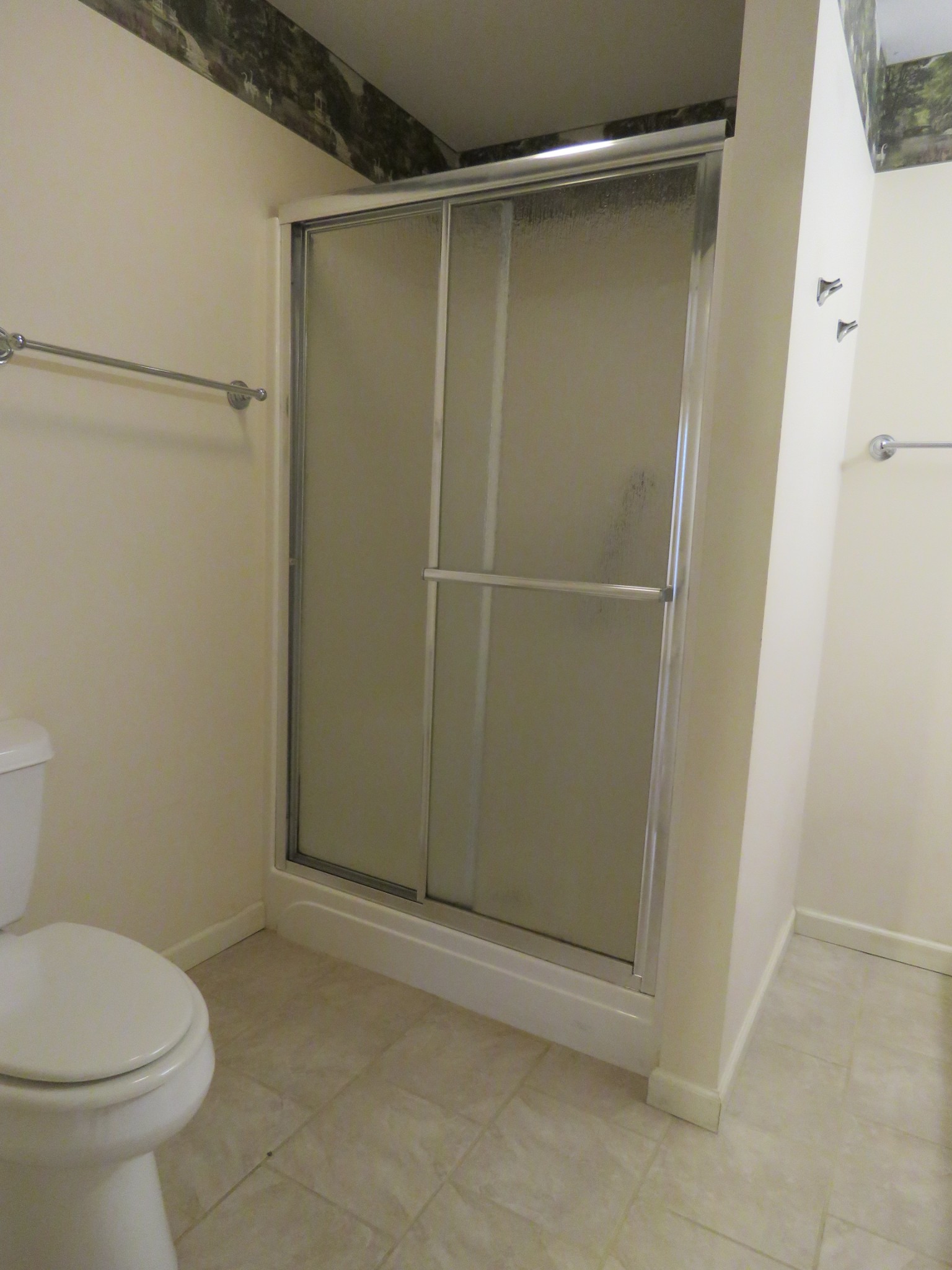 751 Yonside Drive Sparta, TN 38583 - Photo 14 of 36 a bathroom with a shower and a toilet