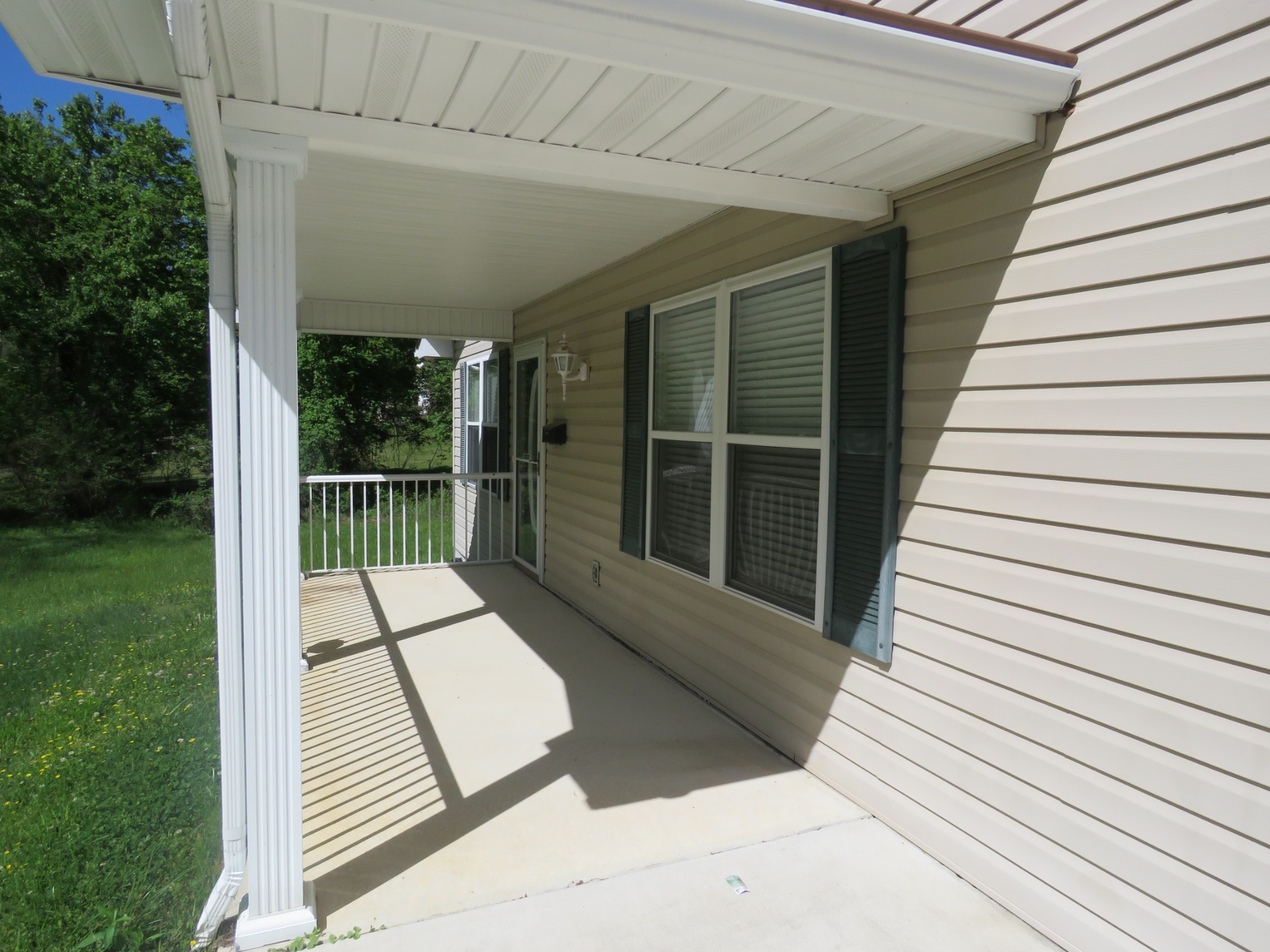 751 Yonside Drive Sparta, TN 38583 - Photo 2 of 36 a view of a balcony with wooden floor