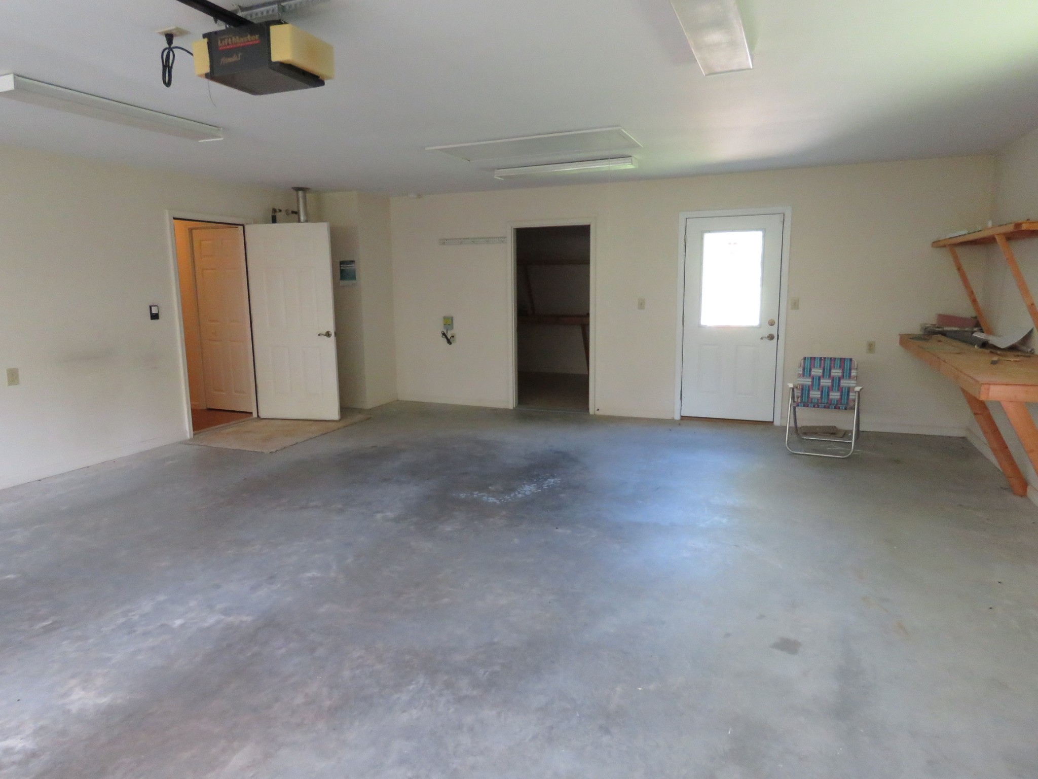 751 Yonside Drive Sparta, TN 38583 - Photo 22 of 36 a view of empty room with window and fireplace