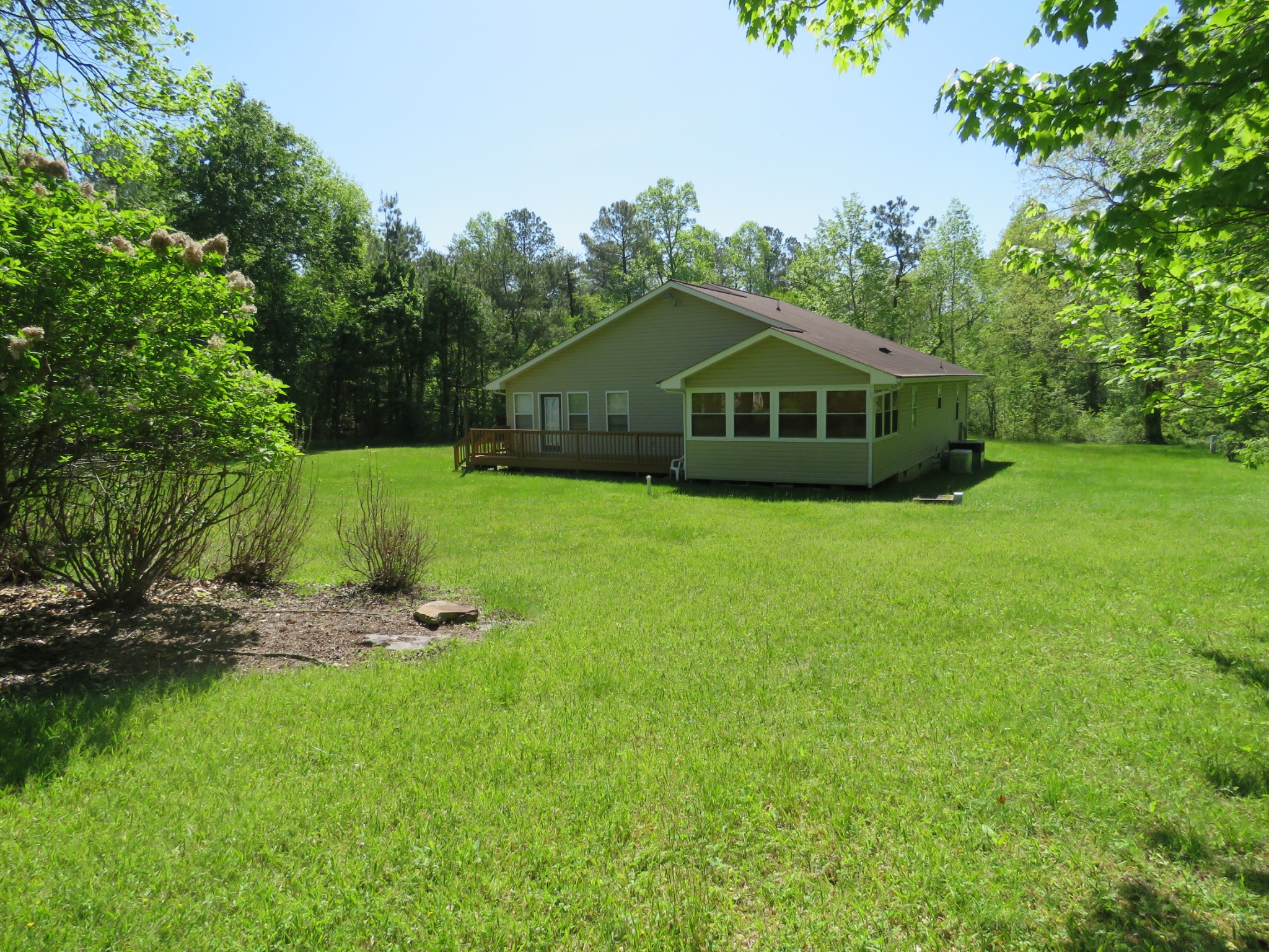 751 Yonside Drive Sparta, TN 38583 - Photo 30 of 36 a front view of a house with a yard