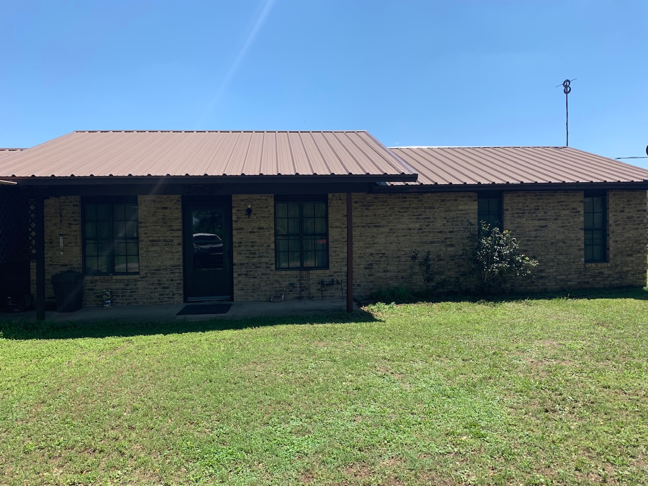 133 Clearfork Road Lockhart, TX 78644 - Photo 7 of 19 a front view of a house with a yard