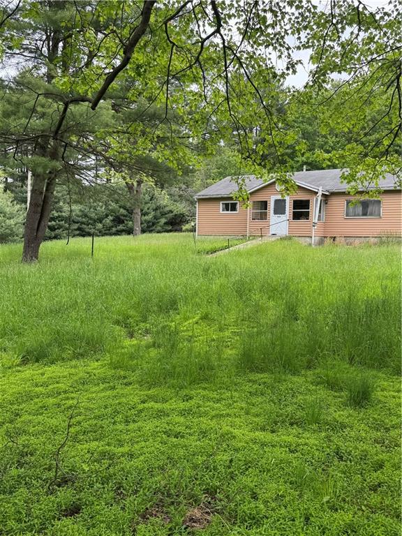 1547 Rishell Road Rossiter, PA 15772 - Photo 1 of 11 a front view of a house with a yard