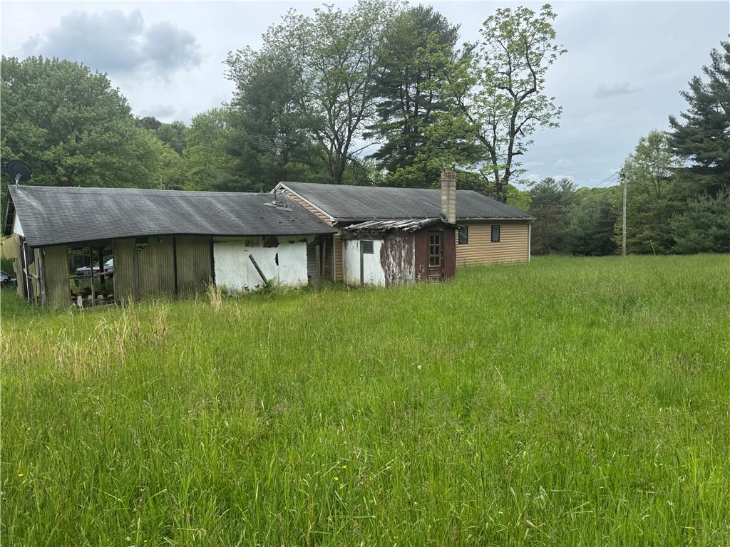 1547 Rishell Road Rossiter, PA 15772 - Photo 5 of 11 a backyard of a house with lots of green space