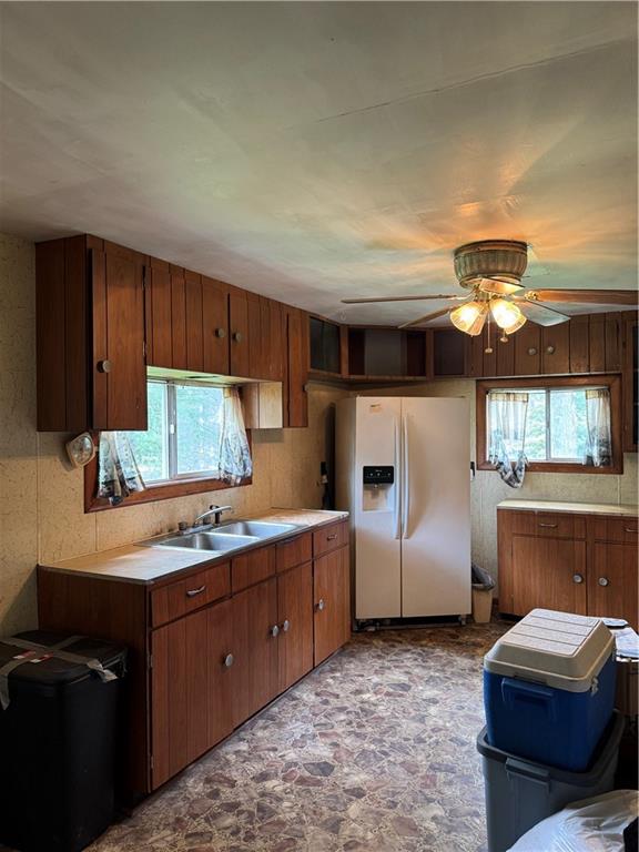 1547 Rishell Road Rossiter, PA 15772 - Photo 7 of 11 a kitchen with refrigerator and cabinets