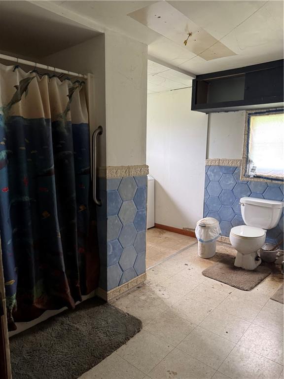 1547 Rishell Road Rossiter, PA 15772 - Photo 9 of 11 a living room with furniture and a window