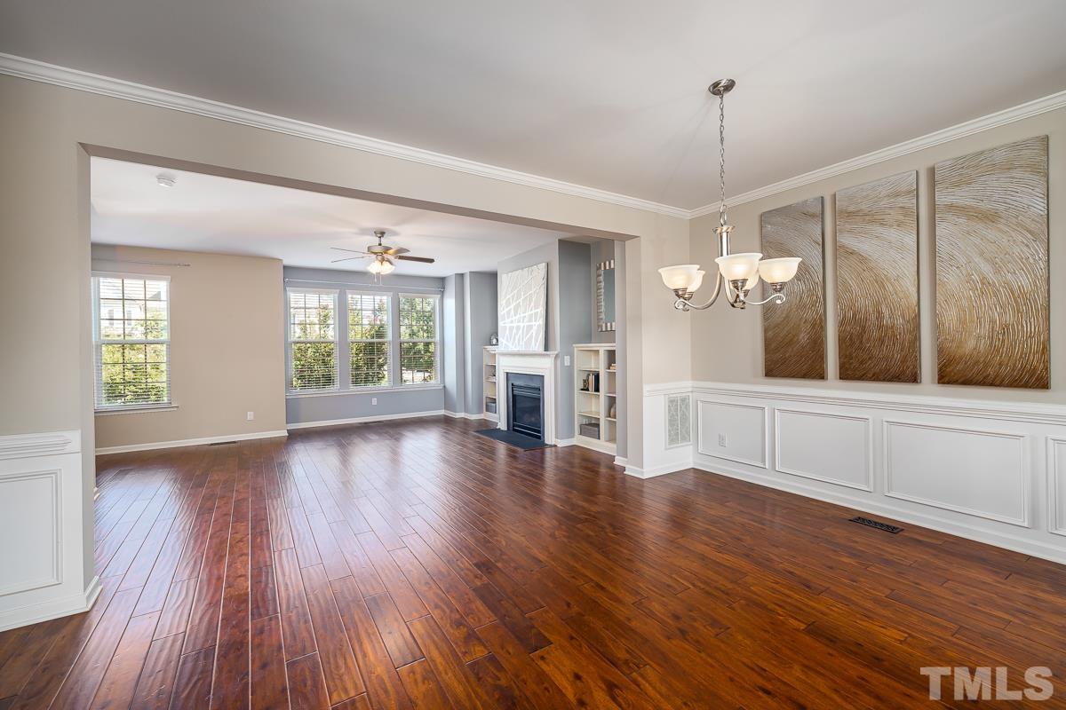 1327 Rembrandt Circle Raleigh, NC 27607 - Photo 20 of 41 a view of an empty room with wooden floor and a window