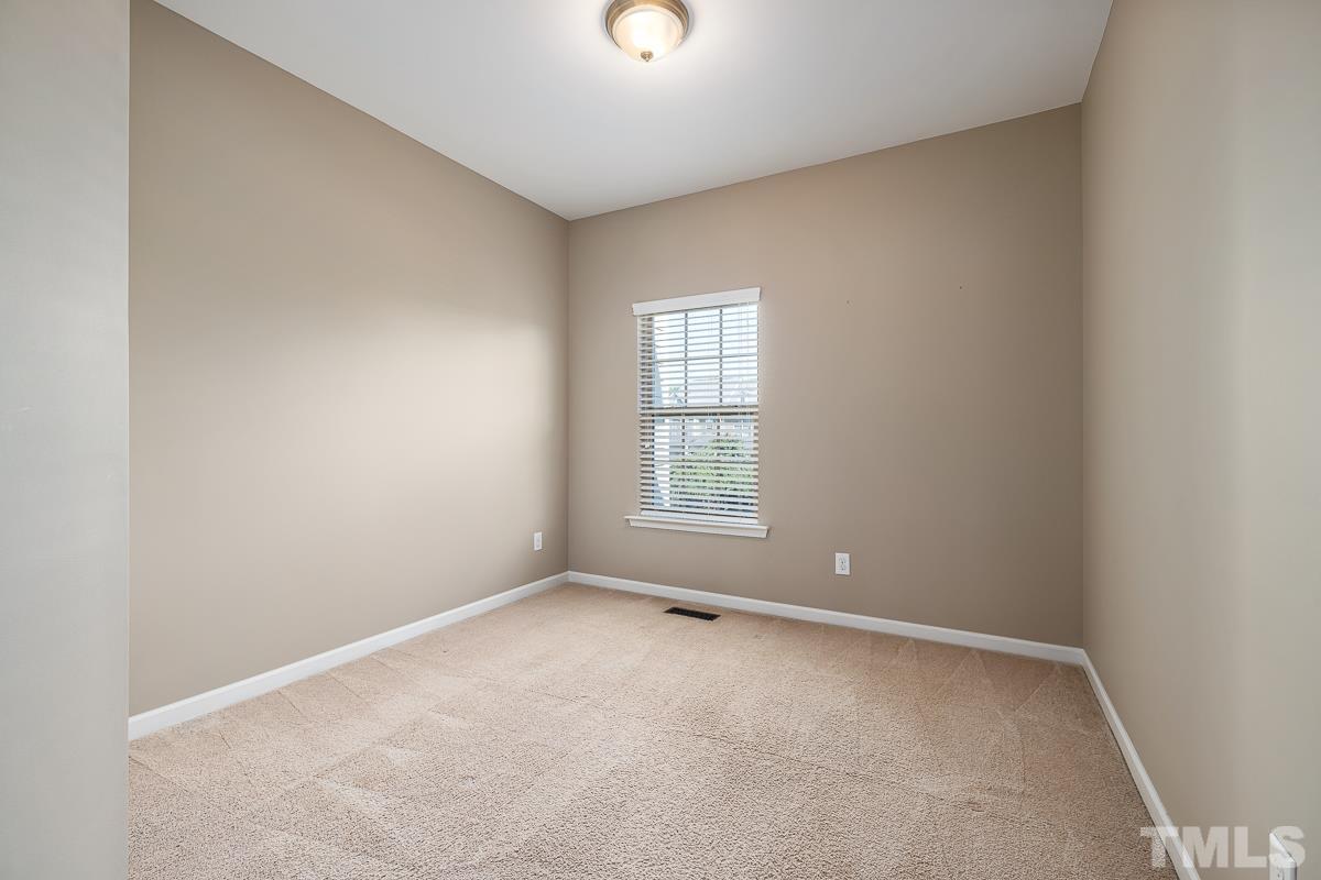 1327 Rembrandt Circle Raleigh, NC 27607 - Photo 30 of 41 a view of an empty room with a window