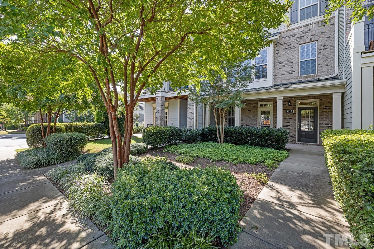 1327 Rembrandt Circle Raleigh, NC 27607 - Photo 3 of 41 a front view of a house with garden