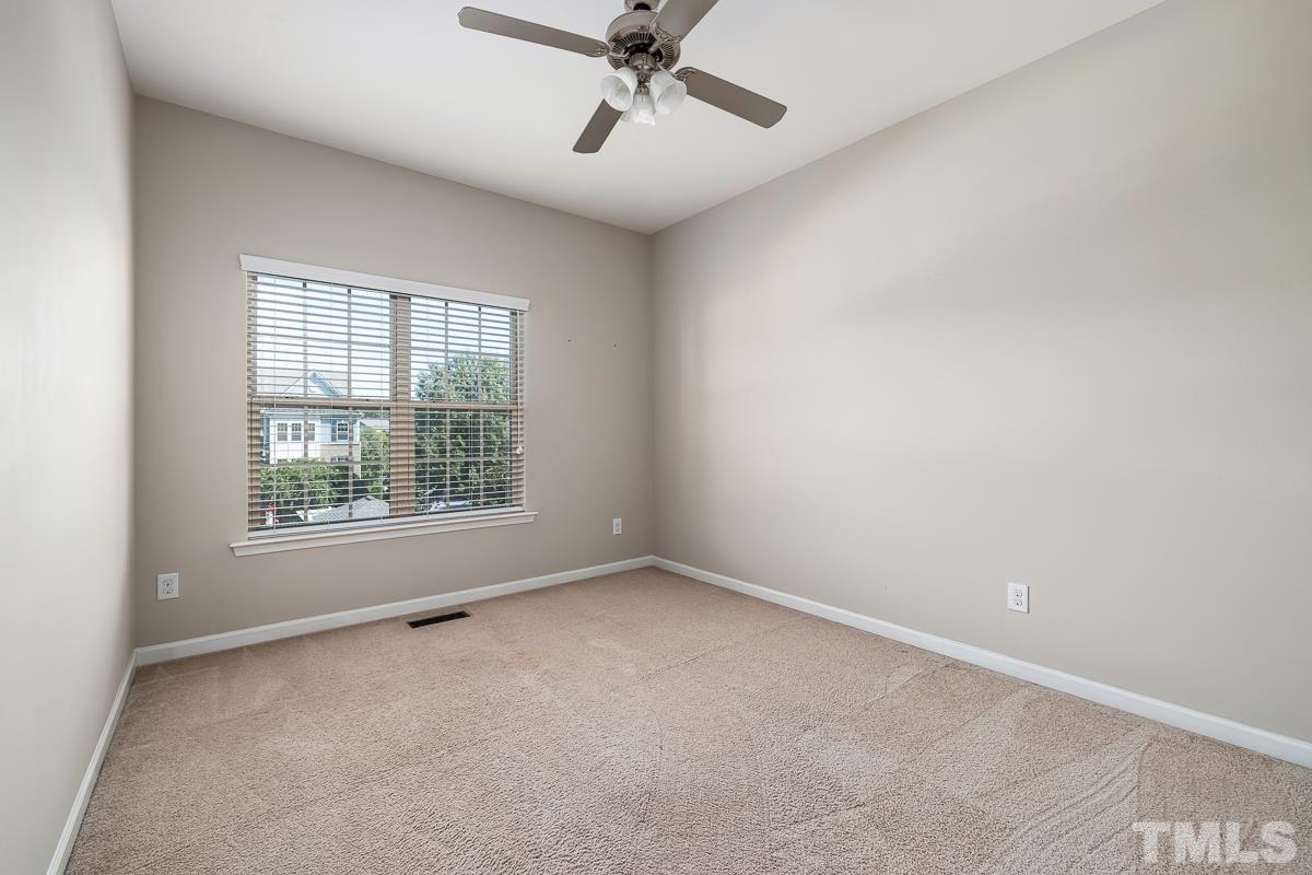 1327 Rembrandt Circle Raleigh, NC 27607 - Photo 32 of 41 an empty room with a window
