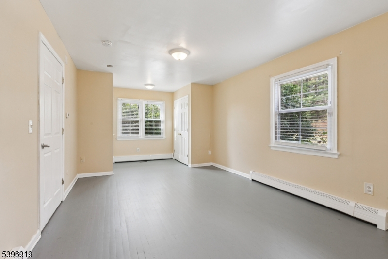 110 Old Turnpike Road Califon, NJ 07830 - Photo 11 of 25 a view of an empty room with a window
