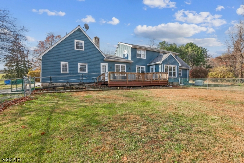 110 Old Turnpike Road Califon, NJ 07830 - Photo 20 of 25 a front view of a house with a yard