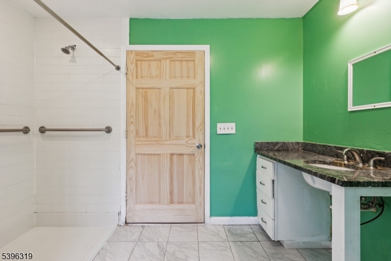 110 Old Turnpike Road Califon, NJ 07830 - Photo 7 of 25 a bathroom with a sink and a mirror