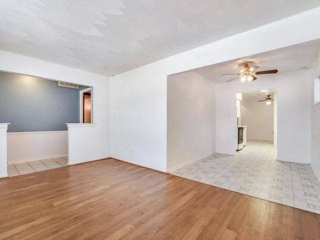 a view of a livingroom with wooden floor