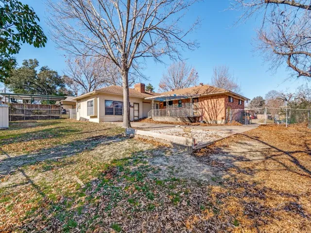 a house with trees in front of it