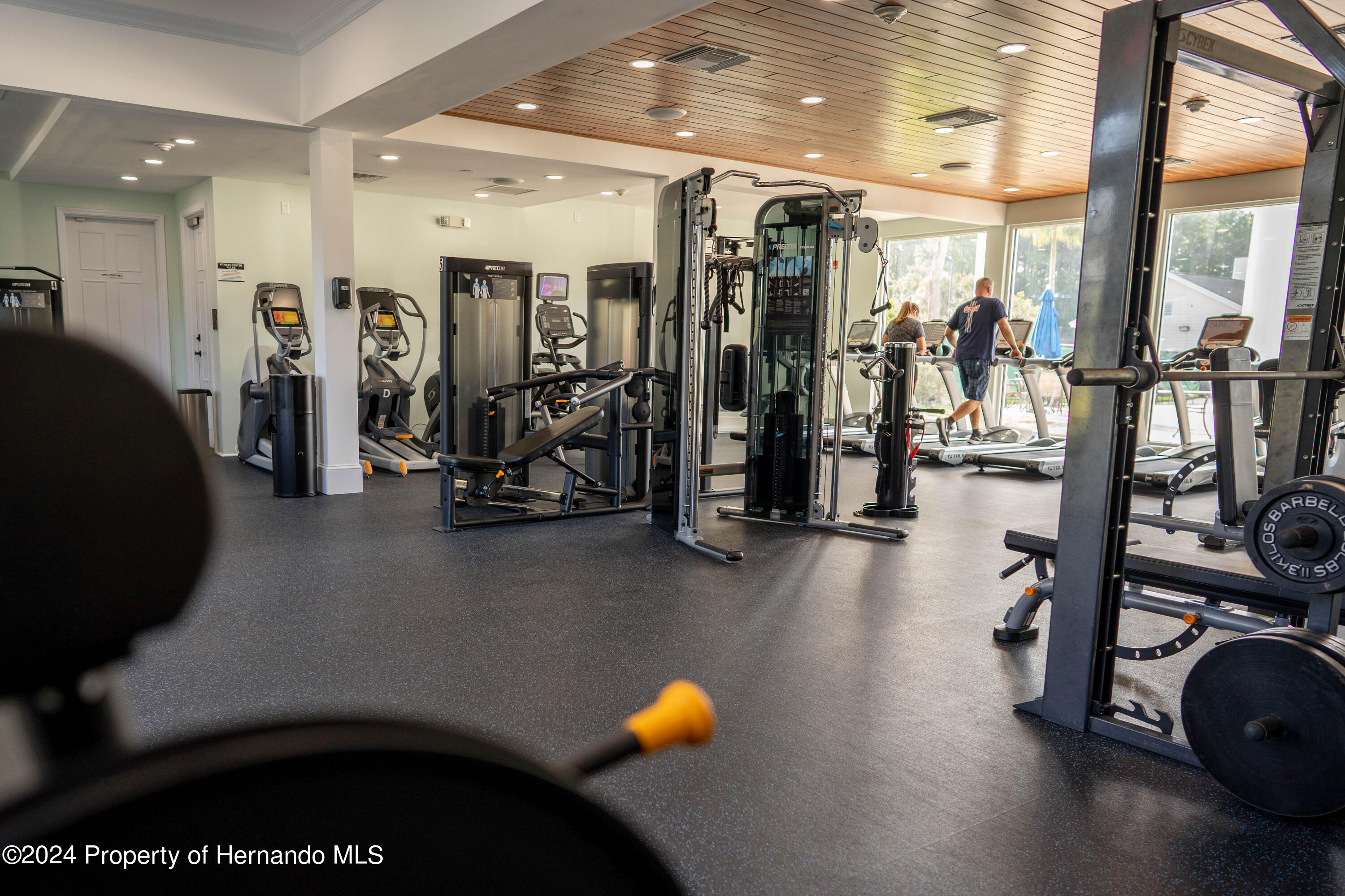 5995 Creek Ridge Road Brooksville, FL 34601 - Photo 6 of 11 a view of a room with gym equipment