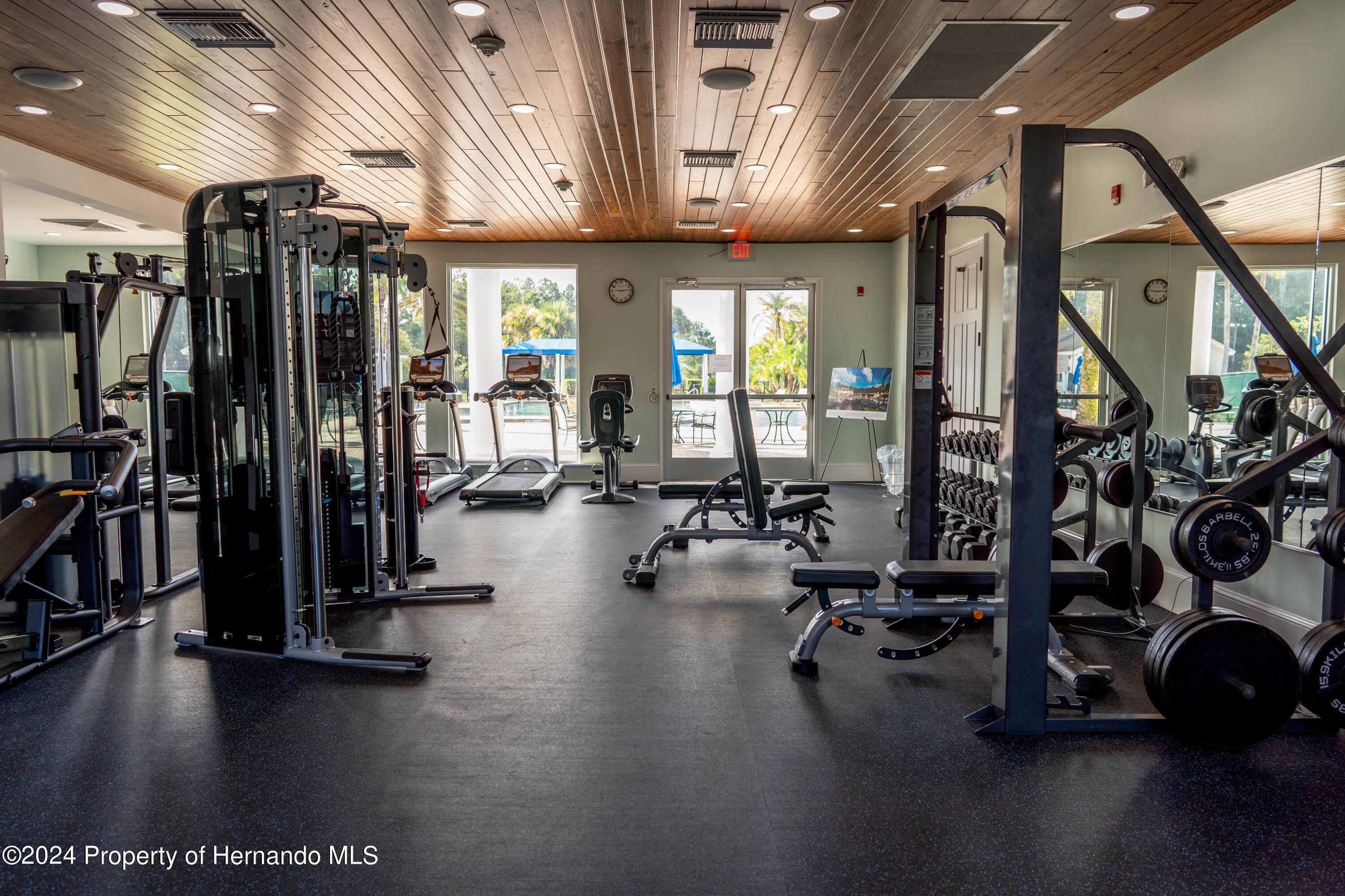 5995 Creek Ridge Road Brooksville, FL 34601 - Photo 7 of 11 a view of a room with gym equipment