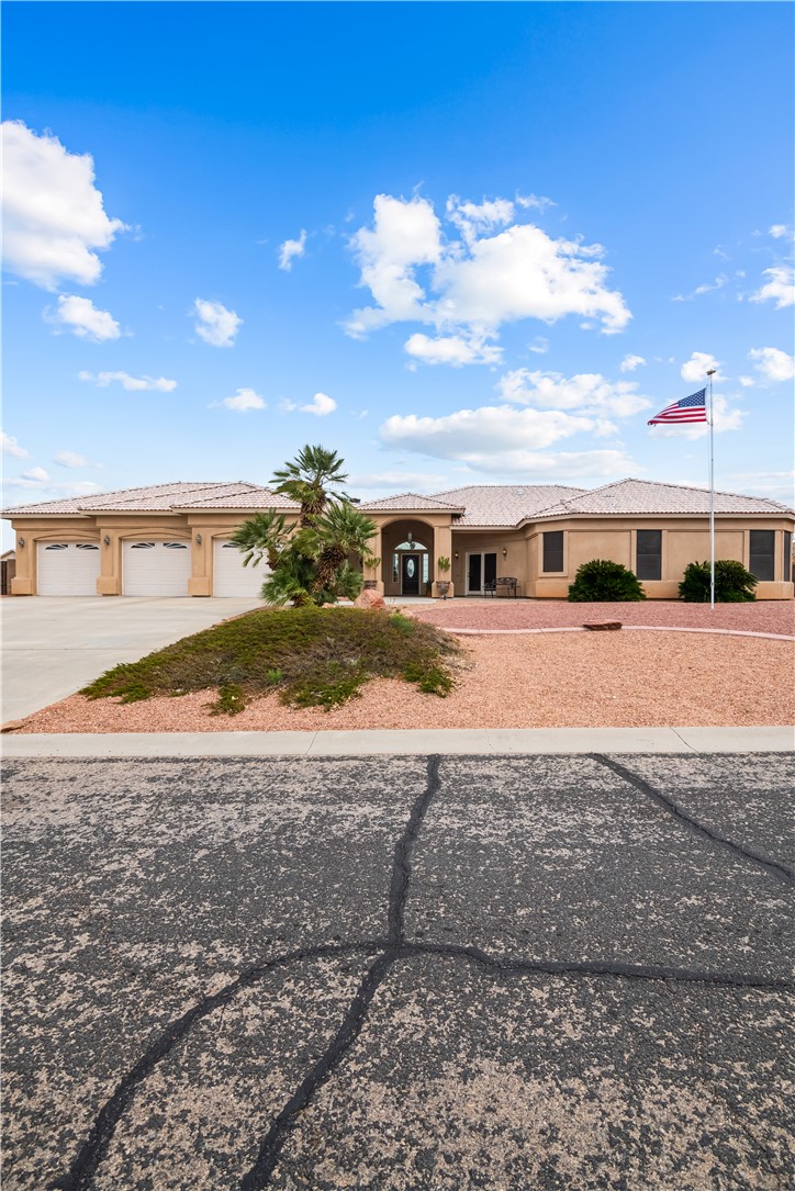 2898 Mountain Trail Road Kingman, AZ 86401 - Photo 58 of 75 a view of a building with floor to ceiling windows