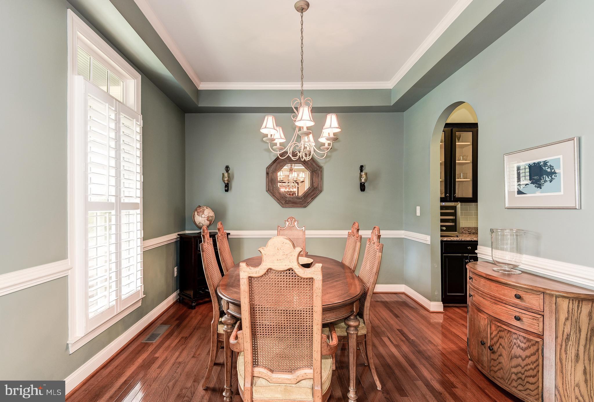 7711 Elmwood Road Fulton, MD 20759 - Photo 13 of 30 Tray ceiling, wood floors, shutters