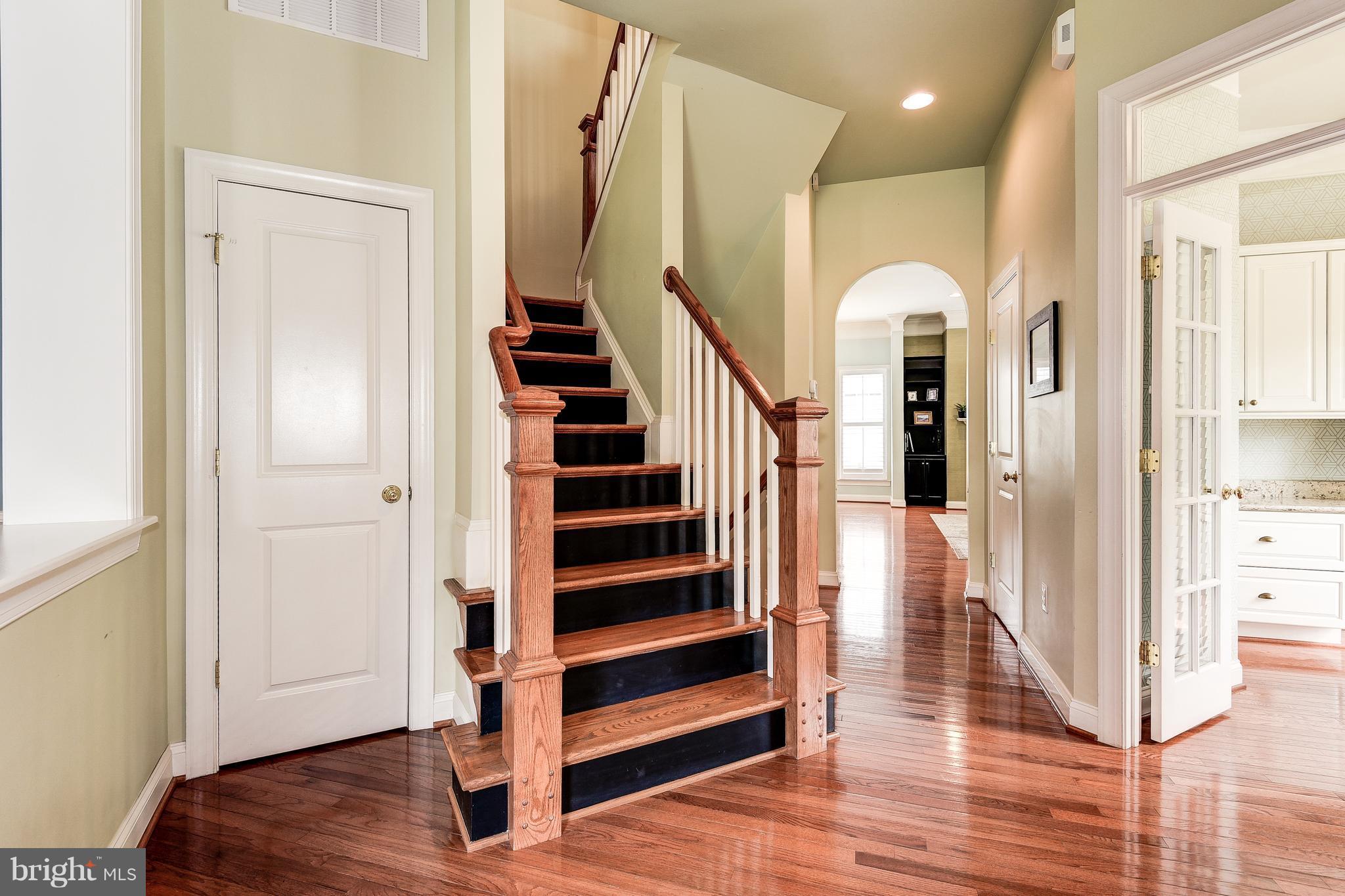7711 Elmwood Road Fulton, MD 20759 - Photo 14 of 30 Wood stairs to owners private level