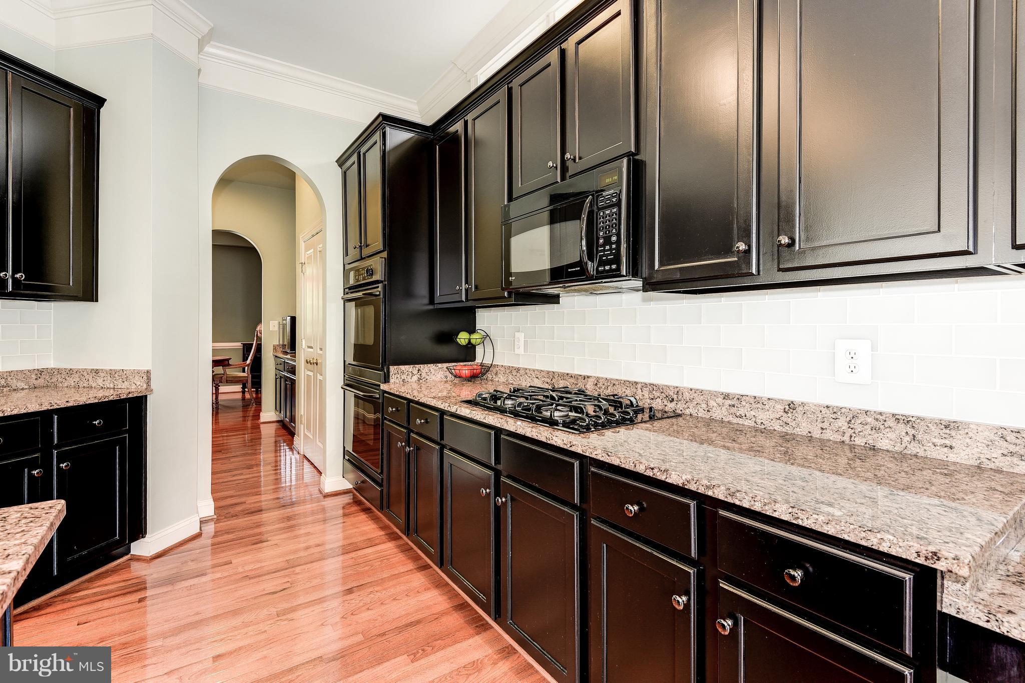 7711 Elmwood Road Fulton, MD 20759 - Photo 9 of 30 Gas cook top with double oven & microwave