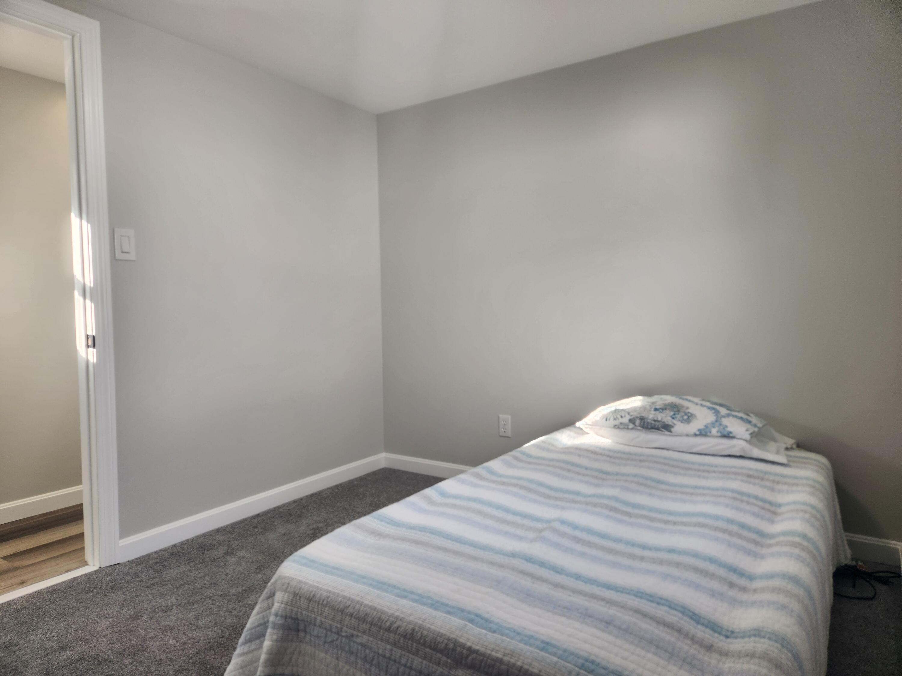 3 4th Avenue Pocasset, MA 02559 - Photo 15 of 23 a bedroom with a bed and a window