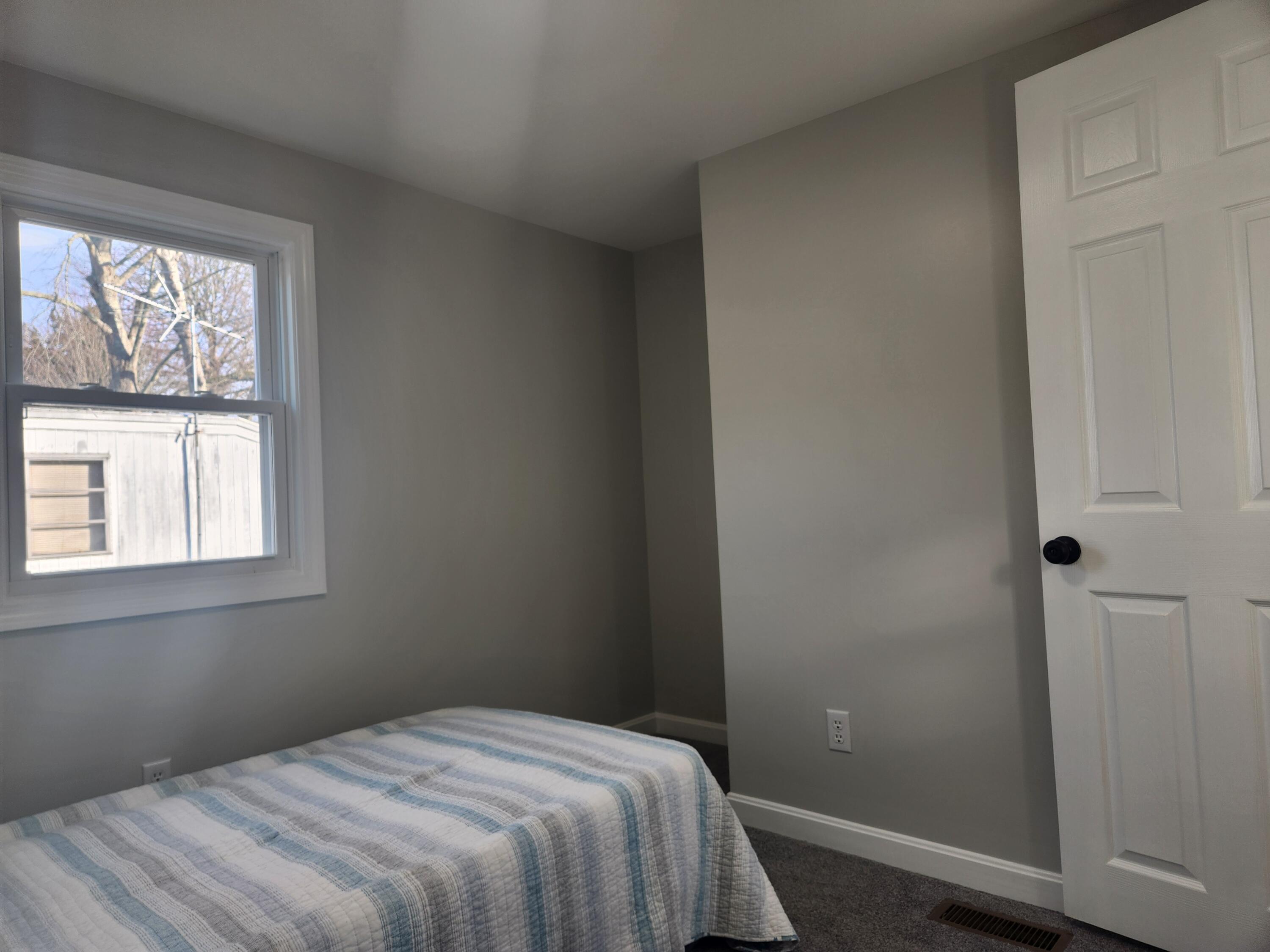 3 4th Avenue Pocasset, MA 02559 - Photo 16 of 23 a bedroom with a bed and a window