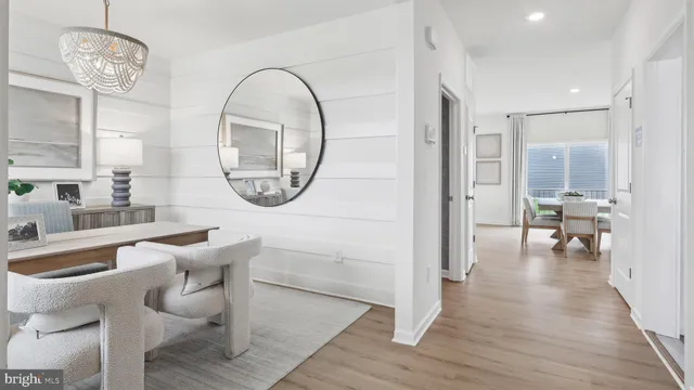 a view of a livingroom with furniture and windows