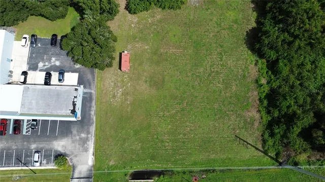 a childrens park with lots of swings and slides