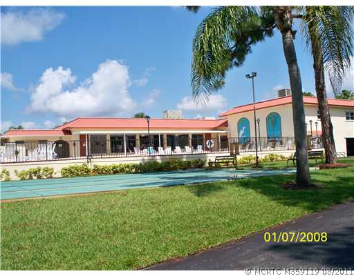 1937 Southwest Palm City Road, Unit 19C Stuart, FL 34994 - Photo 15 of 22 Other. Shuffleboard and pool area