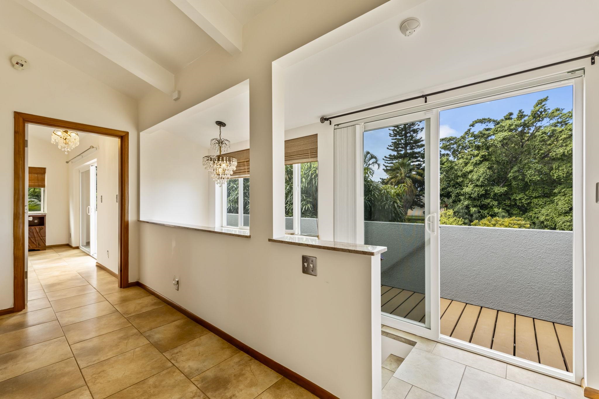 2670 Kanakanui Road Kihei, HI 96753 - Photo 21 of 41 a view of a hallway with furniture and windows