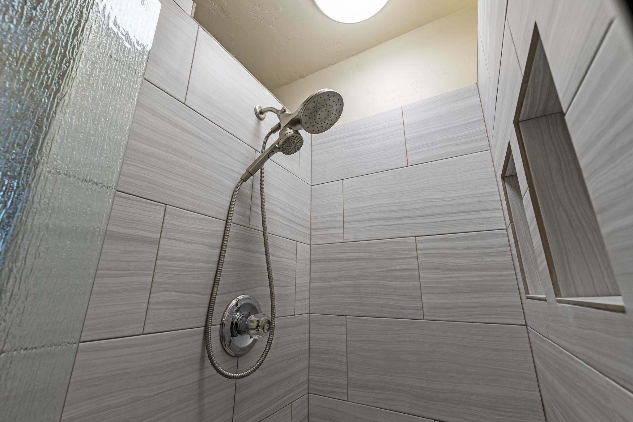 2670 Kanakanui Road Kihei, HI 96753 - Photo 34 of 41 a bathroom with a shower