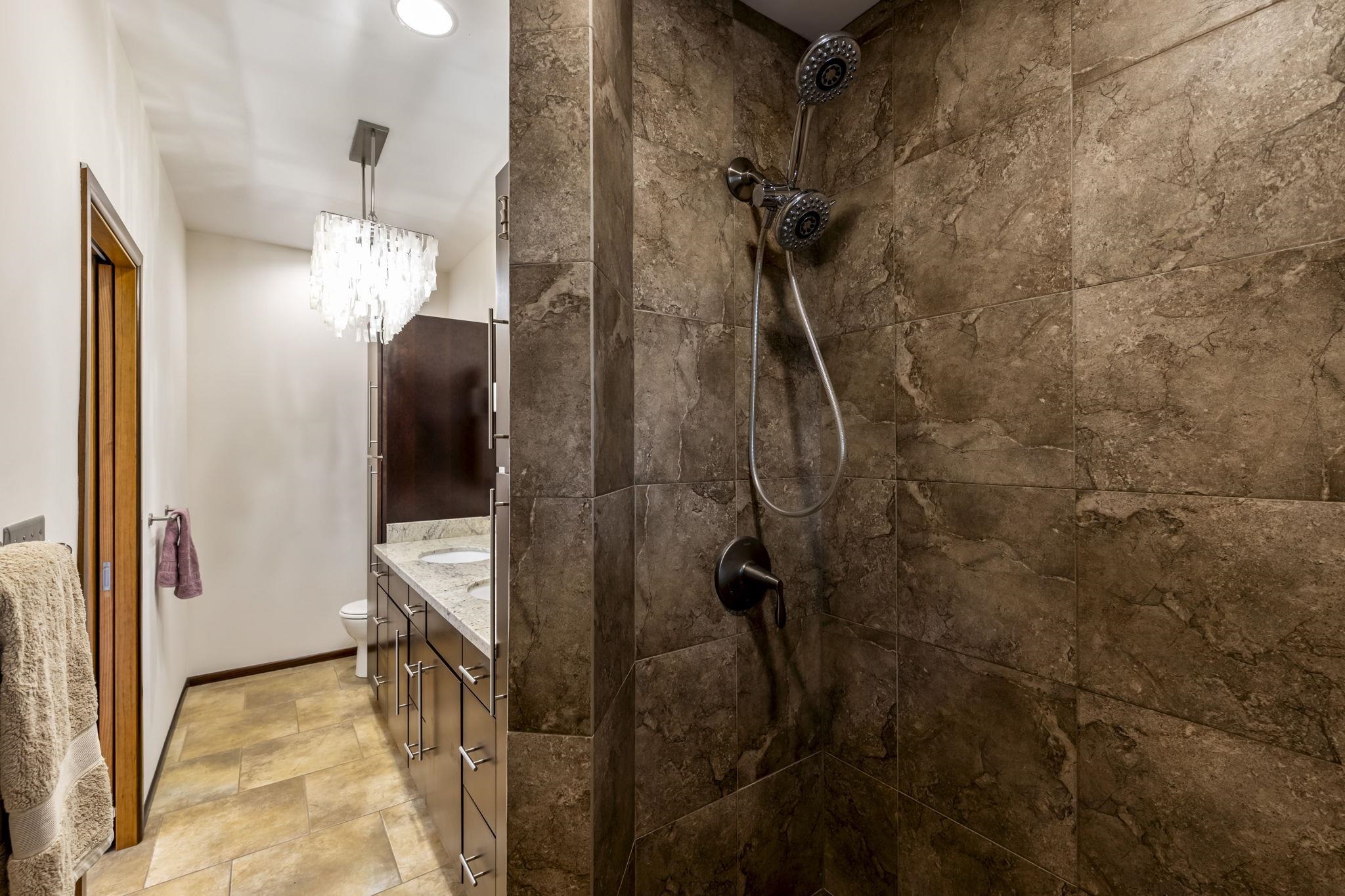 2670 Kanakanui Road Kihei, HI 96753 - Photo 37 of 41 a bathroom with a shower